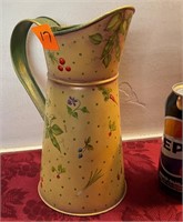 Vintage tole pitcher with floral design