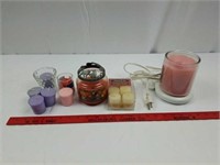 Various candles with candle warmer
