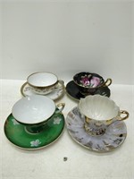 4 hand decorated cups & saucers