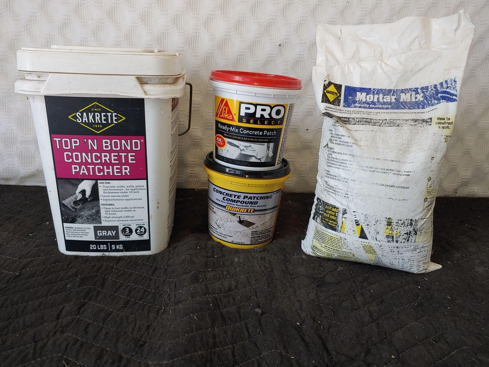 3 containers of concrete patch, 1 bag mortar mix