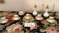 5 demitasse cups with saucers, 2 cruets with