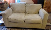 Quality Beige Upholstered Love Seat