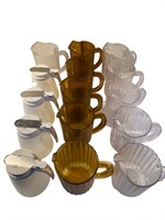 LOT - (15) Water pitchers and creamers. See photos