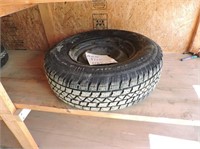 New GM tire  and two Firestone Temporary Tires