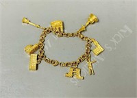 gold plated charm bracelet w/ monument charms