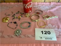 BRACELETS AND BROOCHES