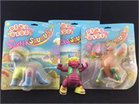 Dino Kids figures. Original packaging is dirty