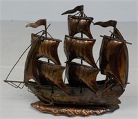 Metal ship model.