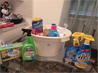 Tub of cleaning supplies