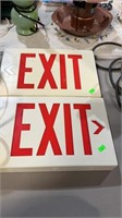 Two exit signs