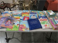 TABLE FULL OF CHILDRENS BOOKS