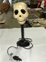 LIGHTED SKULL WINDOW CANDLE