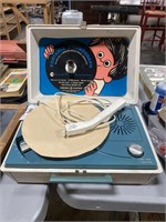 Portable vintage GE record player.