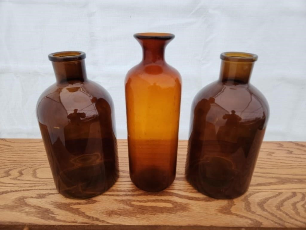 Three large decorative Brown glass vases