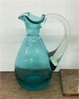 Blown art glass pitcher