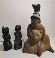 African pottery + Carved Tiki knick knacks