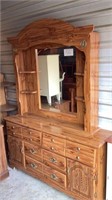 Dresser with a mirror measures approximately 80