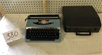 BROTHER TYPEWRITER AND CASE