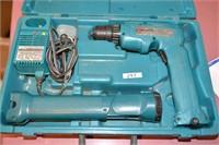 Makita Drill with Charger, 2 Batteries and a