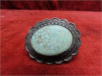 Silver & turquoise broach pin.