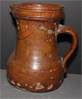 Redware pitcher, 9.5" high, has crack & glaze is