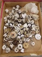 Porcelain knobs of various sizes