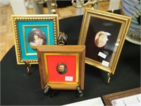 Three pieces of framed handpainted porcelain: