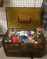 Vintage sewing box filled with a variety of sewing