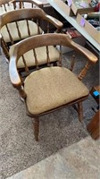 Four heavy oak solid wood chairs with brown