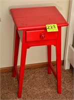 Red antique side table w/ drawer