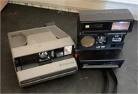 2 Polaroid cameras