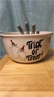 Trick or treat white bowl / gray hand