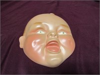 Vintage Baby head face chalkware plaque.