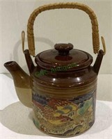 Vintage ceramic oriental themed teapot with