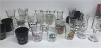 Advertising large group of shot glasses