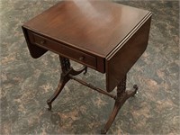 Drop leaf table made by Fine Arts Furniture Co,