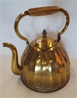 Brass tea kettle. Measures 12" tall.