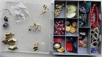 Tons Of Pairs Of Pierced Earrings In Organizer