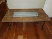 Wooden coffee table with glass insert