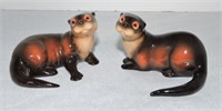 Porcelain pair of otter figures, 3 1/2"