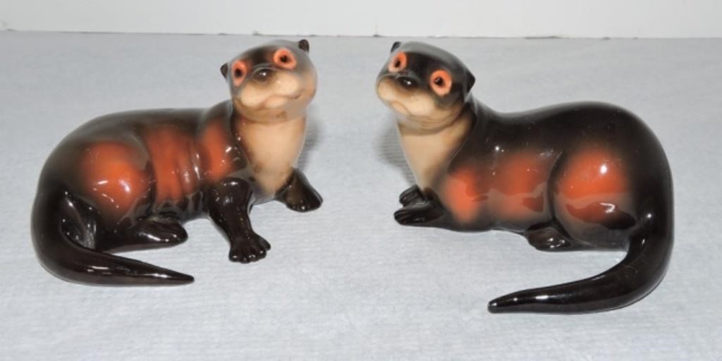 Porcelain pair of otter figures, 3 1/2"