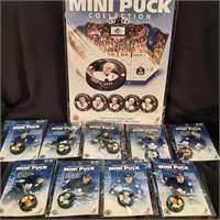 9 x Maple Leafs Mini Pucks and Board