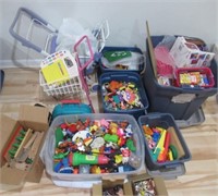 Large group of childrens toys including cars,