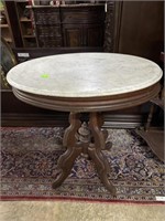 Oval Marble top side table - 29 1/4” x 23 1/4” x
