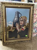 Needlepoint Artwork of Woman holding jug and ruby