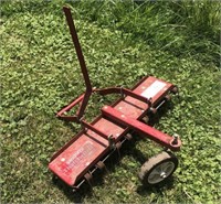 Vintage Snapper Thatcherizer pull behind lawn