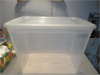 A PLASTIC STORAGE CONTAINER