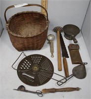 Hand woven basket with graters, sifters, and butte