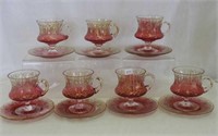 Set of 7 Moser rubina decorated cups & saucers