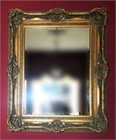 Ornately Framed Beveled Wall Mirror